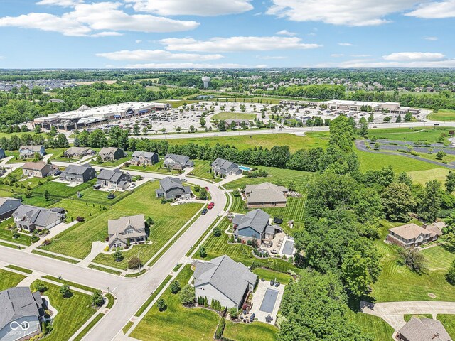 644 Ridge Gate Dr, Brownsburg, IN 46112 - aerial perspective of suburban area featuring a tree filled landscape