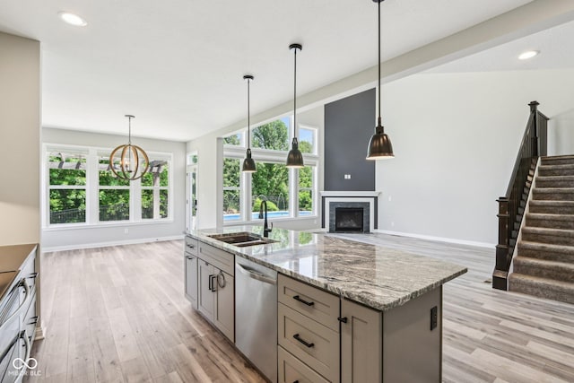 644 Ridge Gate Dr, Brownsburg, IN 46112 - kitchen with dishwasher, a sink, gray cabinetry, light wood-type flooring, and recessed lighting
