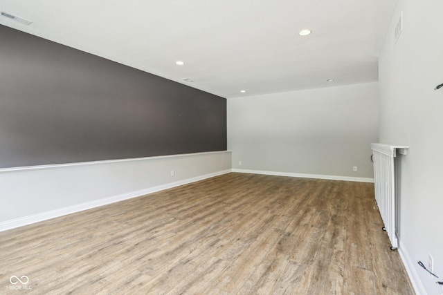 644 Ridge Gate Dr, Brownsburg, IN 46112 - spare room featuring wood finished floors, recessed lighting, and baseboards