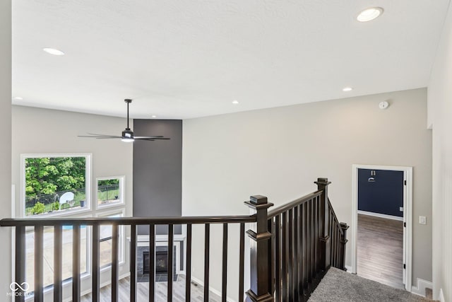 644 Ridge Gate Dr, Brownsburg, IN 46112 - staircase with recessed lighting, baseboards, a ceiling fan, and wood finished floors
