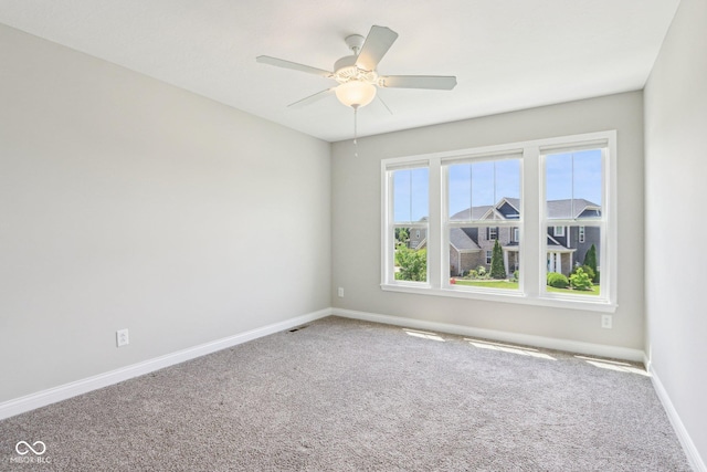 644 Ridge Gate Dr, Brownsburg, IN 46112 - carpeted spare room with baseboards and ceiling fan
