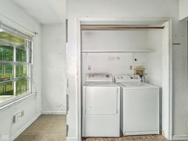 3615 N Dequincy St, Indianapolis, IN 46218 - washroom with separate washer and dryer and light floors