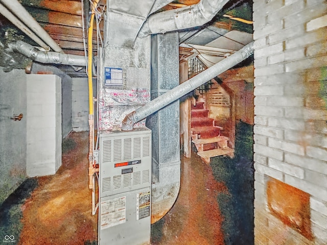3615 N Dequincy St, Indianapolis, IN 46218 - utility room with heating unit