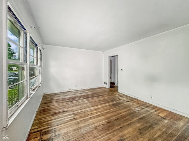 3615 N Dequincy St, Indianapolis, IN 46218 - spare room featuring wood finished floors