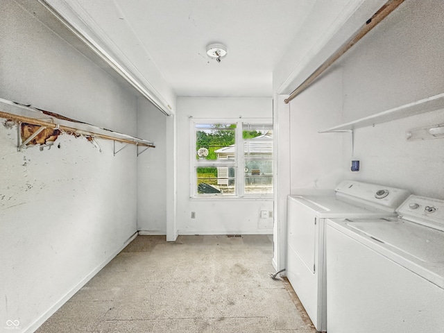 3615 N Dequincy St, Indianapolis, IN 46218 - laundry room featuring washer and dryer and baseboards
