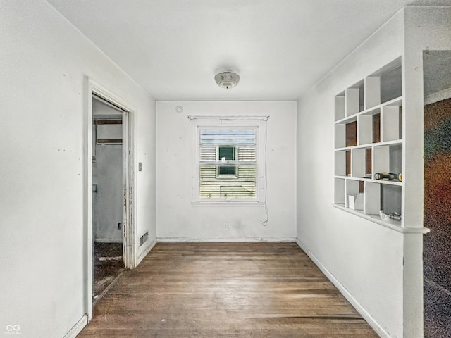 3615 N Dequincy St, Indianapolis, IN 46218 - spare room with wood finished floors