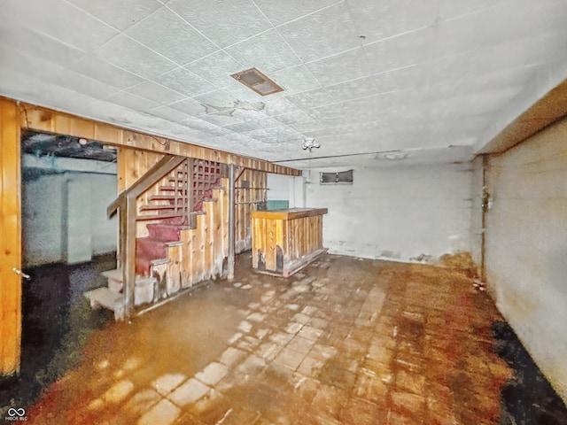 3615 N Dequincy St, Indianapolis, IN 46218 - unfinished basement featuring stairs and a bar
