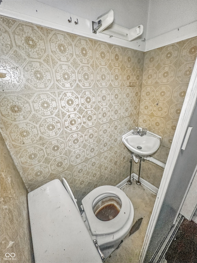 3615 N Dequincy St, Indianapolis, IN 46218 - bathroom with a sink and toilet