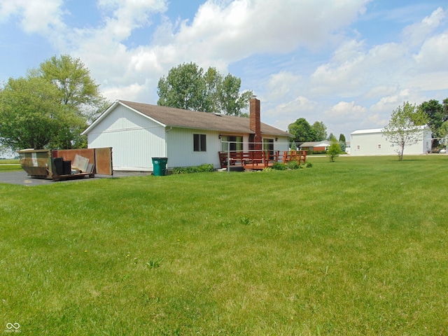 2625 S 200 E, Lebanon, IN 46052 - rear view of property with a chimney, a yard, and a wooden deck