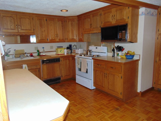 2625 S 200 E, Lebanon, IN 46052 - kitchen with white range with electric stovetop, black microwave, paneled dishwasher, light countertops, and a sink