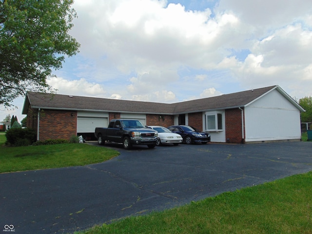 2625 S 200 E, Lebanon, IN 46052 - ranch-style house featuring brick siding, a front yard, and asphalt driveway