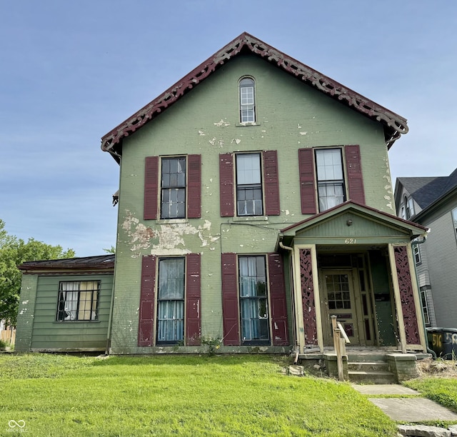 621 E Main St, Muncie, IN 47305 - view of front of property featuring a front yard