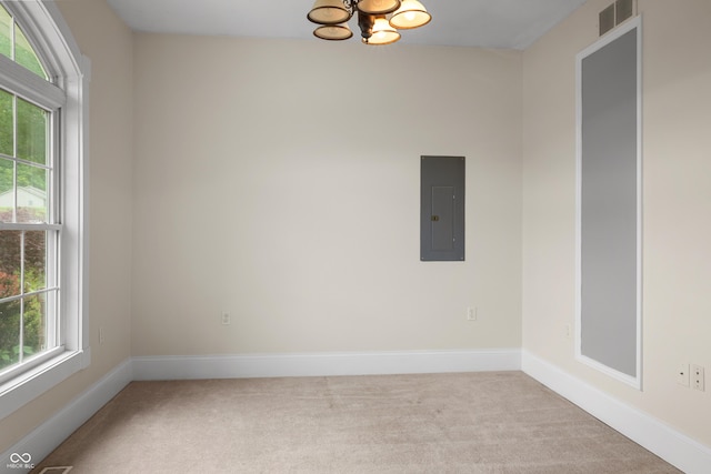 435 Cedar View Ln, Bedford, IN 47421 - carpeted spare room with electric panel, a chandelier, and baseboards