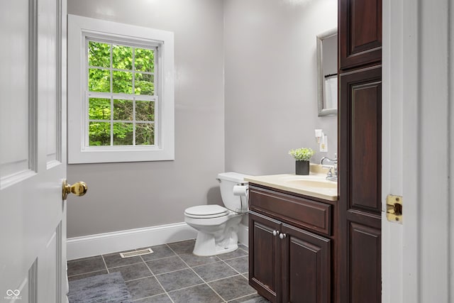 435 Cedar View Ln, Bedford, IN 47421 - bathroom with vanity, tile patterned floors, toilet, and baseboards