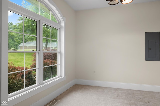 435 Cedar View Ln, Bedford, IN 47421 - carpeted spare room featuring electric panel, baseboards, and a chandelier