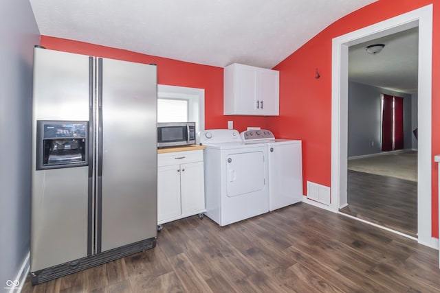 1310 N Cherry St, Rushville, IN 46173 - laundry area featuring dark wood-type flooring, independent washer and dryer, and cabinet space