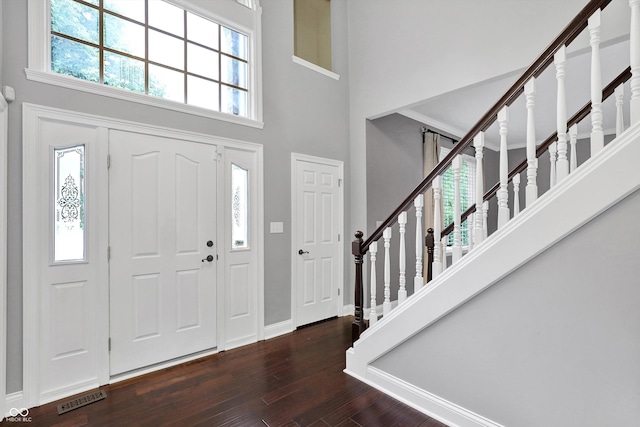 1410 Shadow Ct, Zionsville, IN 46077 - entrance foyer featuring a towering ceiling, wood finished floors, and stairs