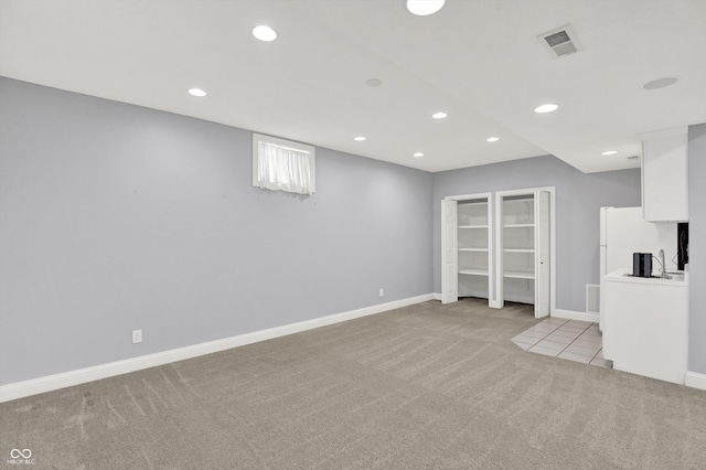 1410 Shadow Ct, Zionsville, IN 46077 - unfurnished living room with light colored carpet and recessed lighting