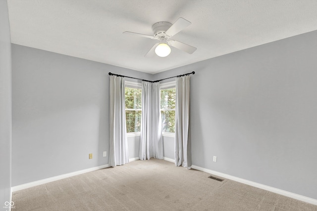 1410 Shadow Ct, Zionsville, IN 46077 - carpeted empty room featuring a ceiling fan and a textured ceiling