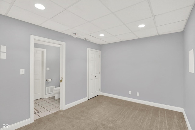 1410 Shadow Ct, Zionsville, IN 46077 - carpeted empty room with recessed lighting, a paneled ceiling, and tile patterned flooring