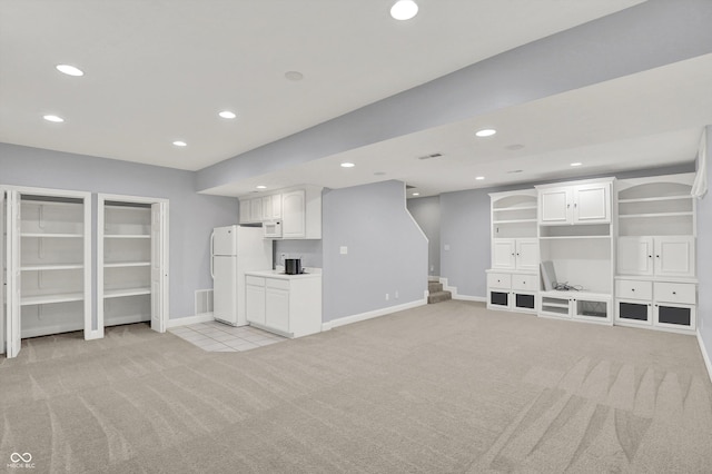 1410 Shadow Ct, Zionsville, IN 46077 - unfurnished living room with light colored carpet, recessed lighting, and stairs