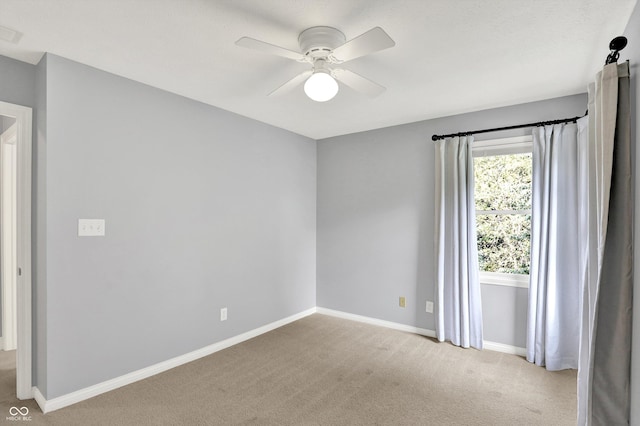 1410 Shadow Ct, Zionsville, IN 46077 - carpeted empty room with baseboards and a ceiling fan