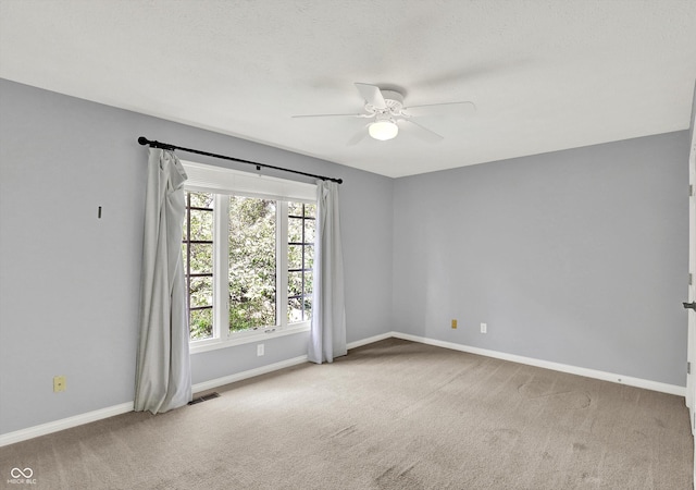 1410 Shadow Ct, Zionsville, IN 46077 - carpeted spare room with ceiling fan and baseboards