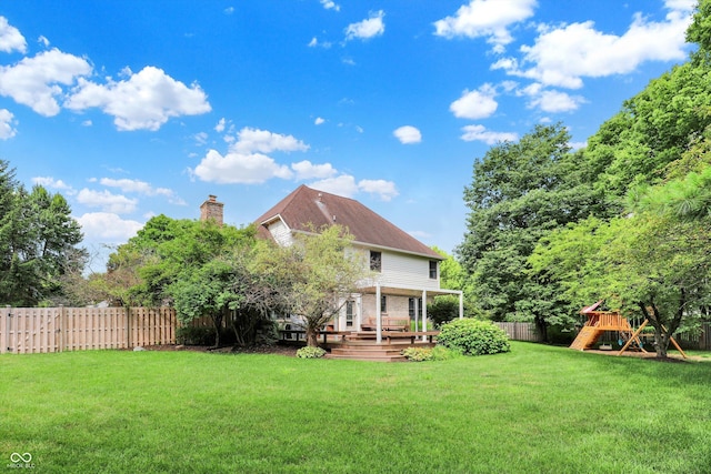 1410 Shadow Ct, Zionsville, IN 46077 - fenced backyard featuring a playground and a deck