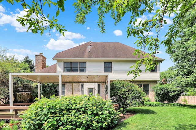 1410 Shadow Ct, Zionsville, IN 46077 - rear view of property featuring brick siding, a shingled roof, and a chimney
