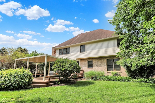 1410 Shadow Ct, Zionsville, IN 46077 - back of house with a wooden deck, a lawn, and brick siding
