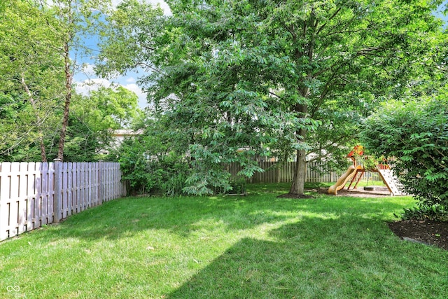 1410 Shadow Ct, Zionsville, IN 46077 - fenced backyard featuring a playground