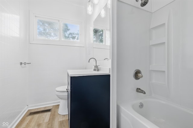903 Sunset Dr, Lebanon, IN 46052 - full bath featuring vanity, toilet, shower / bathtub combination, and wood finished floors