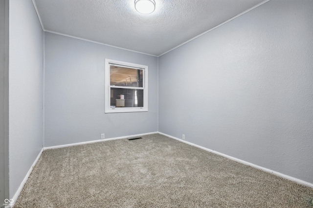 903 Sunset Dr, Lebanon, IN 46052 - carpeted spare room featuring a textured ceiling, baseboards, and ornamental molding