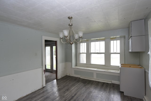 364 S Cole St, Indianapolis, IN 46241 - unfurnished dining area with a chandelier, dark wood-type flooring, and baseboard heating