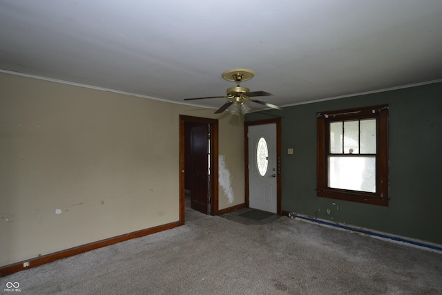 364 S Cole St, Indianapolis, IN 46241 - carpeted entrance foyer featuring a ceiling fan, ornamental molding, baseboards, and baseboard heating