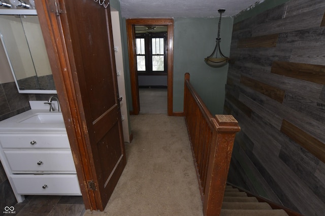364 S Cole St, Indianapolis, IN 46241 - hallway with a sink and an upstairs landing