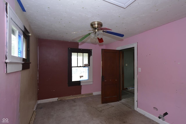 364 S Cole St, Indianapolis, IN 46241 - carpeted empty room featuring baseboards, a baseboard radiator, and a ceiling fan
