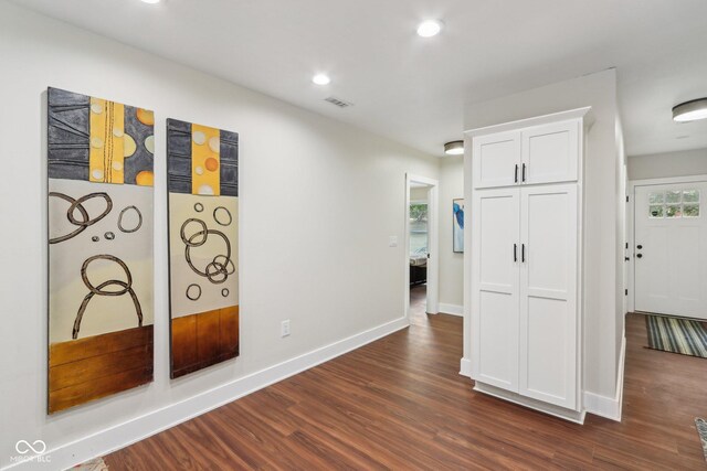617 N Dearborn St, Indianapolis, IN 46201 - corridor featuring dark wood-type flooring, baseboards, and recessed lighting