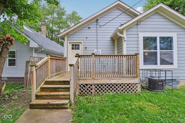 617 N Dearborn St, Indianapolis, IN 46201 - back of property featuring a wooden deck and central AC unit