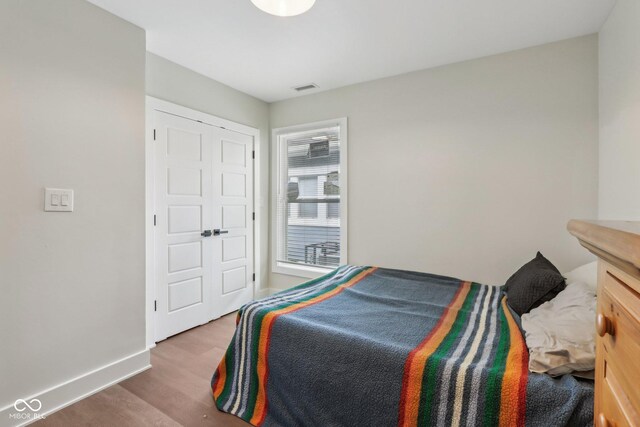617 N Dearborn St, Indianapolis, IN 46201 - bedroom with wood finished floors and baseboards