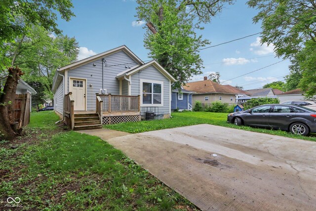 617 N Dearborn St, Indianapolis, IN 46201 - back of house featuring a deck and central AC unit