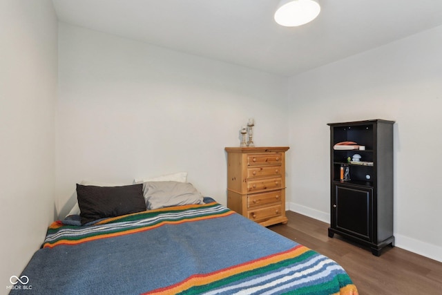 617 N Dearborn St, Indianapolis, IN 46201 - bedroom featuring dark wood-style floors and baseboards