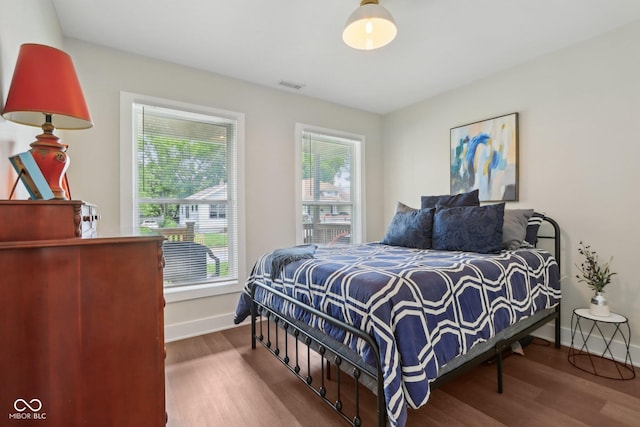 617 N Dearborn St, Indianapolis, IN 46201 - bedroom featuring wood finished floors and baseboards