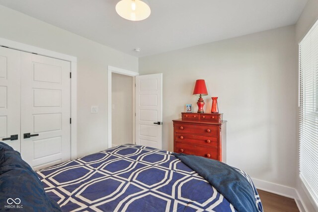 617 N Dearborn St, Indianapolis, IN 46201 - bedroom featuring wood finished floors and baseboards