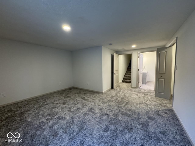 317 W Pierson St, Greenfield, IN 46140 - unfurnished room featuring carpet, stairs, baseboards, and recessed lighting