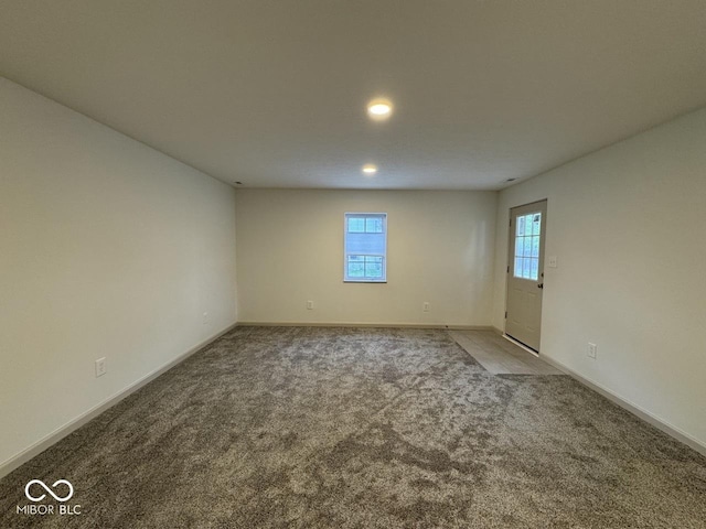 317 W Pierson St, Greenfield, IN 46140 - carpeted empty room with healthy amount of natural light, baseboards, and recessed lighting