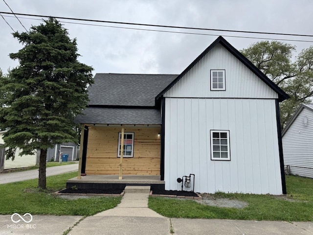 317 W Pierson St, Greenfield, IN 46140 - view of front of house with roof with shingles and a porch