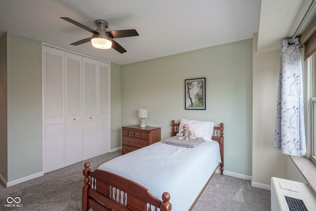 3965 N Meridian St Unit 3J, West, Indianapolis, IN 46208 - bedroom featuring carpet, a closet, baseboards, and ceiling fan