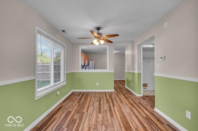 8908 Sunningdale Blvd, Indianapolis, IN 46234 - empty room featuring wood finished floors and ceiling fan