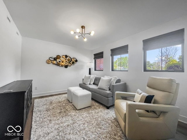 420 Monon Wy Dr, Carmel, IN 46032 - living area with a chandelier, baseboards, and wood finished floors